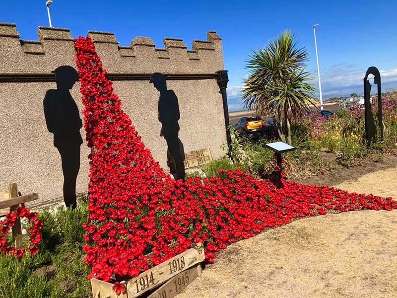 Flowers on a war memorial in Fleetwood